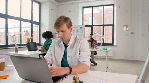 Creative Male Office Worker with Laptop 71