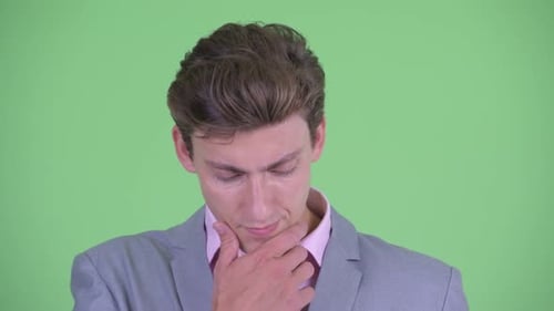 Young Adult Thinking Deeply in Business Suit