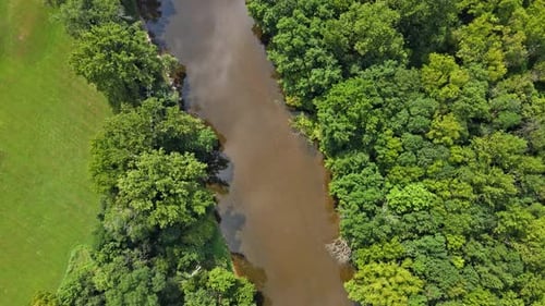 Beautiful Landscape of the River with Water Clouds in the River Winding River River in the Field