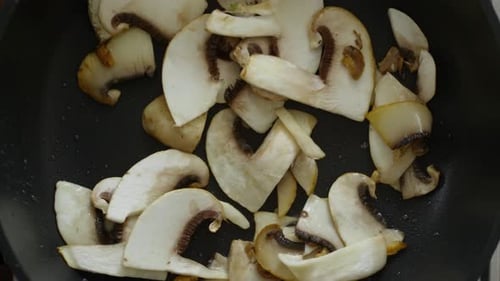 Preparing Mushrooms on Frying Pan
