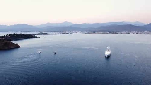 Marine Landscape of Mediterranean Sea Surrounded By Mountain Ridge and Spit with Swimming Boats