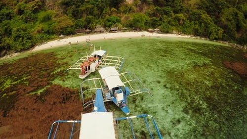 Aerial View Sunset and Atwayan Beach with Rocks and Boats