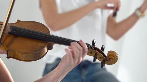 Close Up Woman Play the Violin Lyric Composition