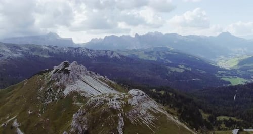 Aerial Flight Above Mountain Top in Overcast Cloudy Weather
