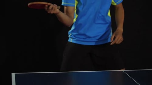 Man Playing Table Tennis In Action