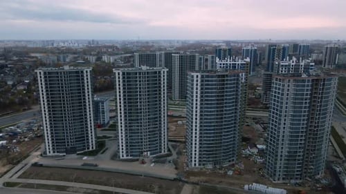 Construction of modern multi-storey buildings. Construction of a new city block.