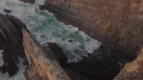 Cliff and Ocean Waves