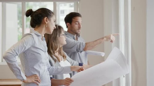 Millennial creative professionals working in a creative office