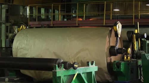 Large Paper Roll Machine in Industrial Factory