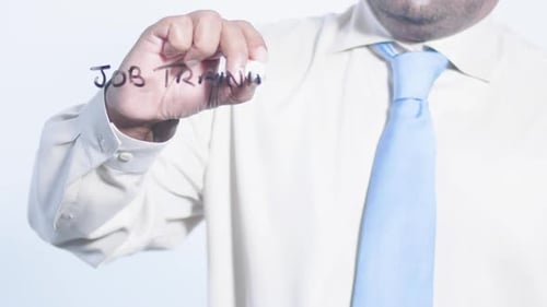 Asian Businessman Writes Job Training