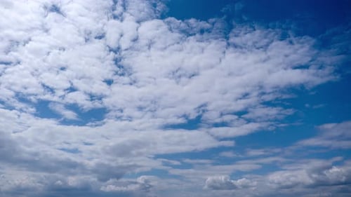Cumulus Clouds Move in the Blue Sky Cloudscape Timelapse
