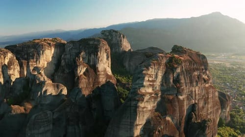 Mountain Monastery n Meteora at Sunset Aerial View