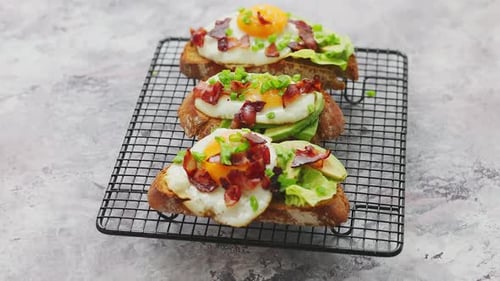 Delicious Avocado Toast with Fried Egg and Bacon