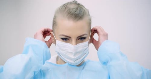 Portrait of Doctor Wearing Protective Mask in Hospital. Covid-19 Coronavirus