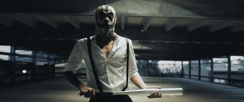 Scary Masked Man with Baseball Bat in Garage