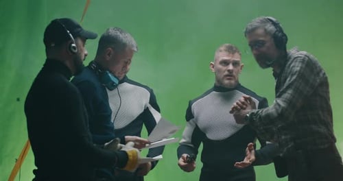 Men On Film Set Preparing Futuristic Scene