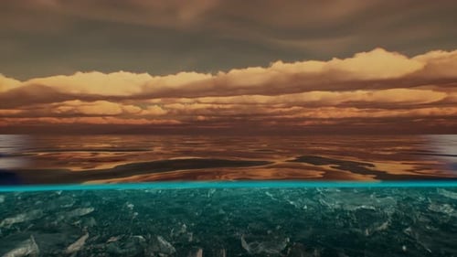 Split View Over and Under Water in the Caribbean Sea with Clouds