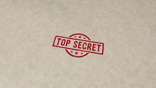 Top Secret Rubber Stamp Imprint Animation on Textured Paper