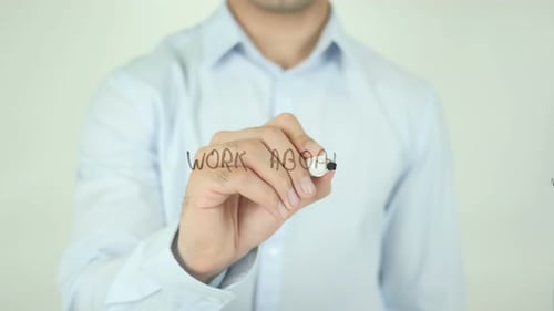 Writing the Words Work Aboard With a Marker