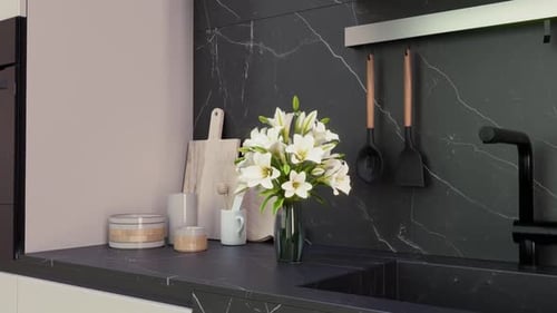 Interior of the Kitchen. Flowers in a vase.