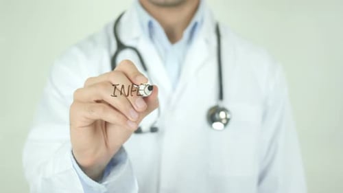 Doctor Writes Infection on Clear Surface