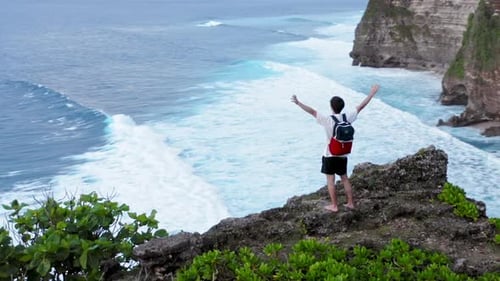 Successful Young Man Silhouette Standing On Ocean Cliff Aerial Raising Arms Happiness Joy Freedom