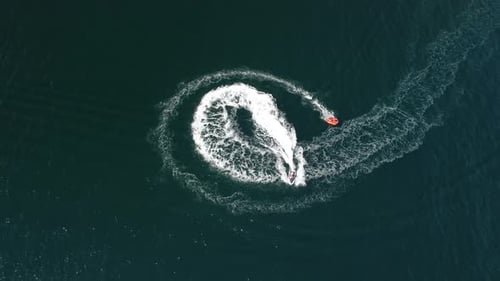 Thrilling Boat Pulls Tube Across Deep Blue Ocean