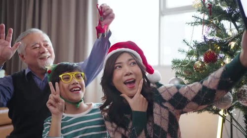 Family Celebrates Christmas with a Festive Selfie