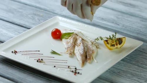 Liquid Pours on Cooked Fish.