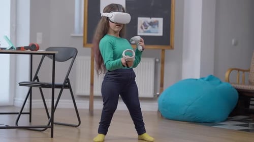 Girl Using VR Headset and Controllers at Home