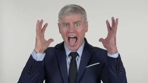 Furious Mature Man Yelling With Anger