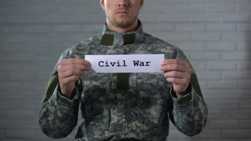 Civil War Word Written on Sign in Hands of Male Soldier, Cruelty and Death