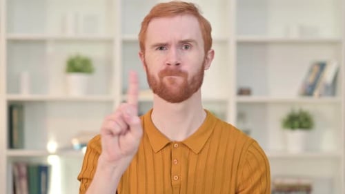 Man Saying No with Finger