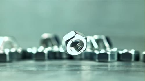 The Nut Falls on the Table and Rotates