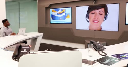 Male and female executives having video call 4k