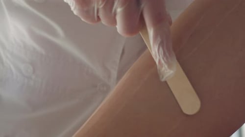 Beauty Treatment in Cosmetology Clinic Laser Hair Removal for Smooth Skin Aesthetician is Applying