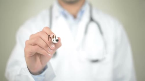 Doctor Writes Medical Care on Transparent Surface