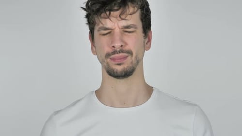 Man Shakes Head Negatively in Close-up Studio Shot