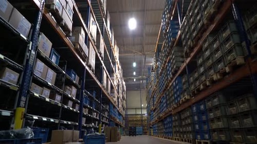 Shelves Full of Product in Large Warehouse Area of Modern Factory 4K