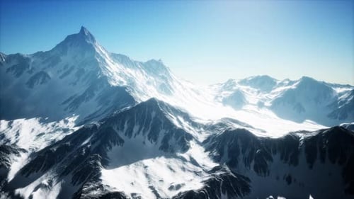 Aerial View of Majestic Snow-Capped Mountains Landscape