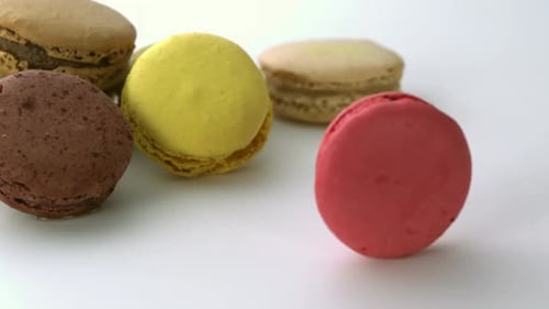 Colorful Macaroons on a White Surface