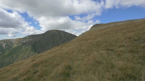 Scenic Green Mountains and Rolling Hills Landscape