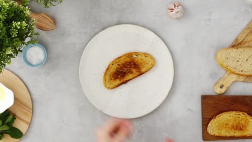 Crop person preparing avocado toast for breakfast in kitchen