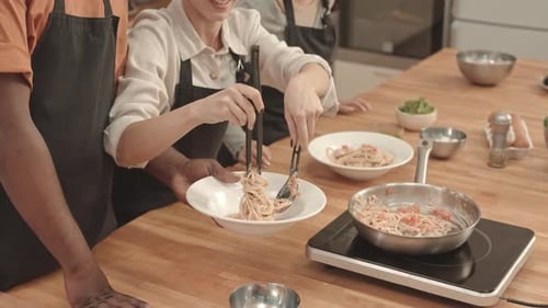 Putting Pasta on Plate