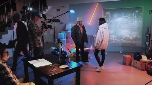 Intense Scene with Gun on Film Set