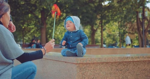Happy Family Having Fun Outdoors in the Park