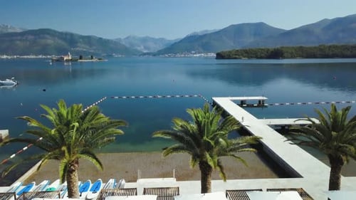 Aerial view from a luxury hotel. Flying over the sea and mountains