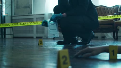 Investigator at a Crime Scene Examining Evidence