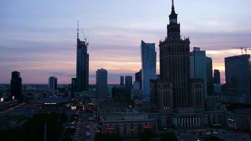 Amazing sunset sky in time-lapse shot of Warsaw city center, Poland, Europe