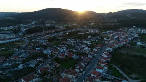 Aerial View of Residential Houses in Suburban Rural Area at Sunset